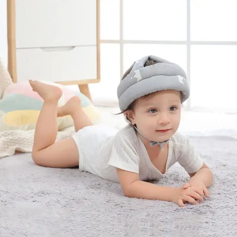 Soft, adjustable, protective baby helmet.
