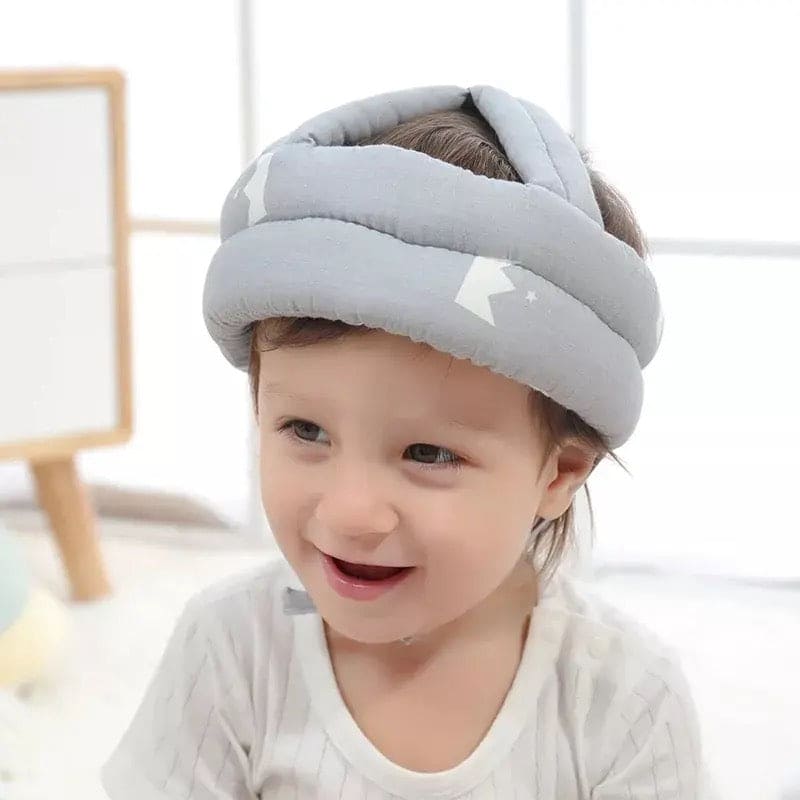 Soft, adjustable, protective baby helmet.